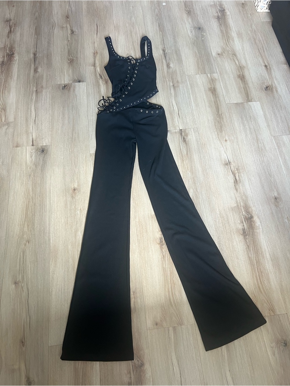 Black Lace-Up Flare Jumpsuit with Eyelet Trim